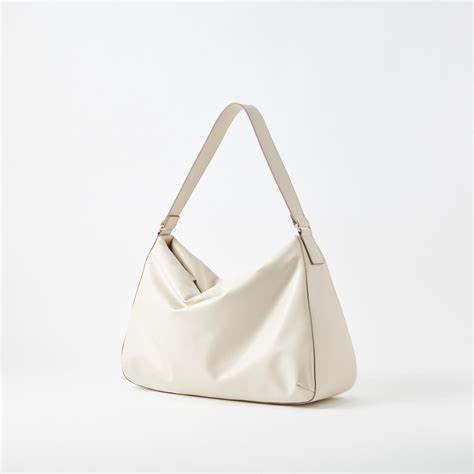 uniqlo puffy bag dupe|uniqlo puffy bag reviews.